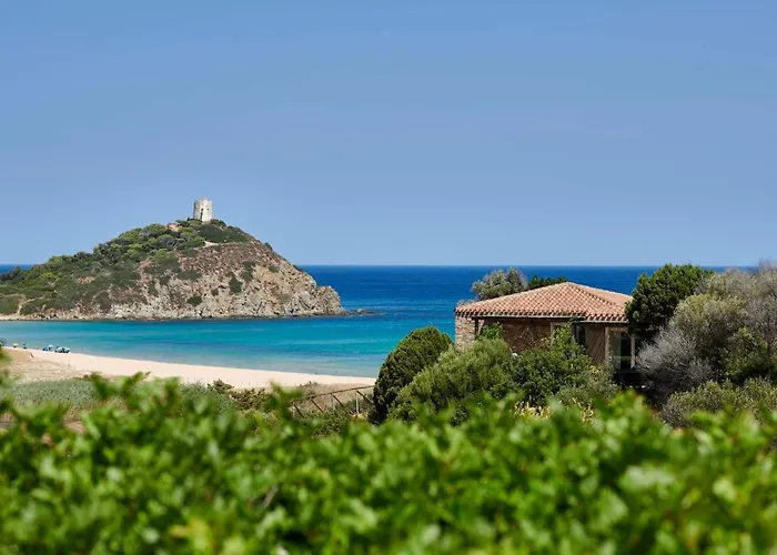 Baia Di Chia Resort Sardinia, Curio Collection By Hilton photo