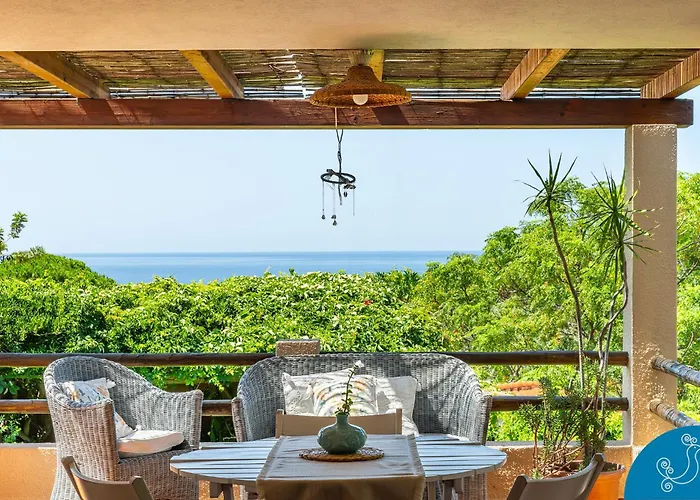 Photo de La Bouganville - House With Garden And Sea View Geremèas